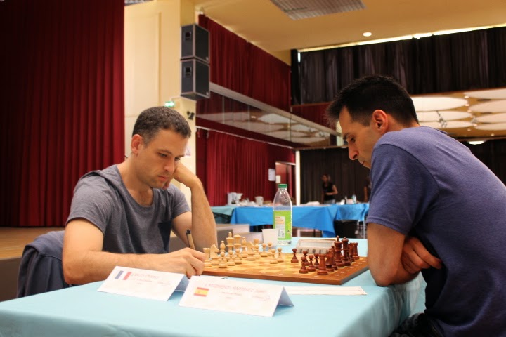 Le GMI Christian Bauer (2649) a concédé une nulle rapide à Sébastien Mazé lors de la ronde 6 du Master de Montpellier 2014 - Photo © Chess & Strategy