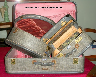 suitcases, metal letters, lace, tablecloths, shoe forms, turquoise dresser