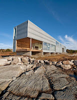 Long And Narrow House Design Follows The Shape Of The Rocky Promontory in Nova Scotia Canada