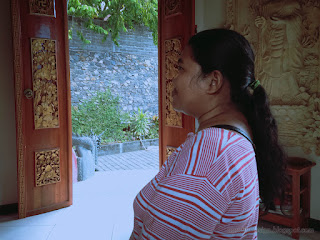 Woman Traveler Enjoy Calm Atmosphere In The Shrine Room Of Buddhist Monastery North Bali Indonesia