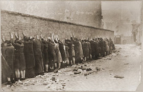 JEWISH FIGHTERS CAPTURED AND LINED UP AGAINST THE WALL - WARSAW GHETTO UPRISING