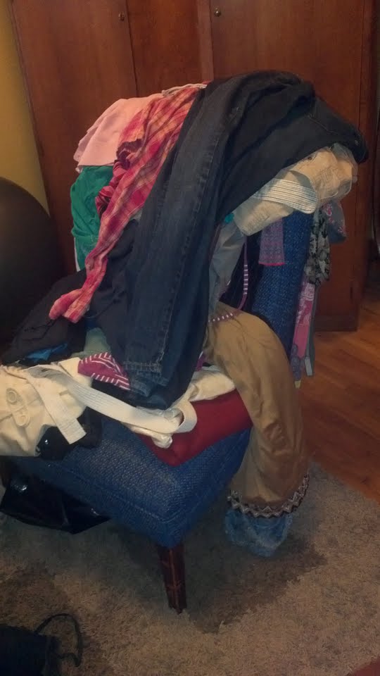 Image result for chair full of clothes