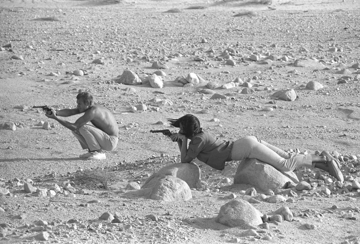 Steve McQueen And Neile Adams His First Wife Target Practice With Their Pistols In The California Desert 1963 Steve McQueen And Neile Adams His First Wife Target Practice With Their Pistols In The California Desert 1963