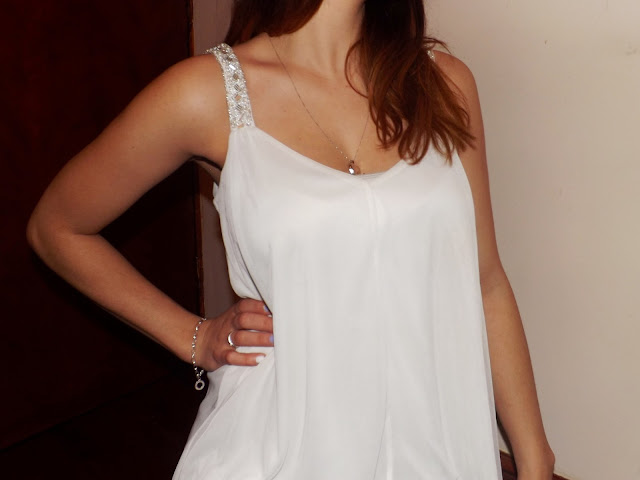 A white cami with embellished staps