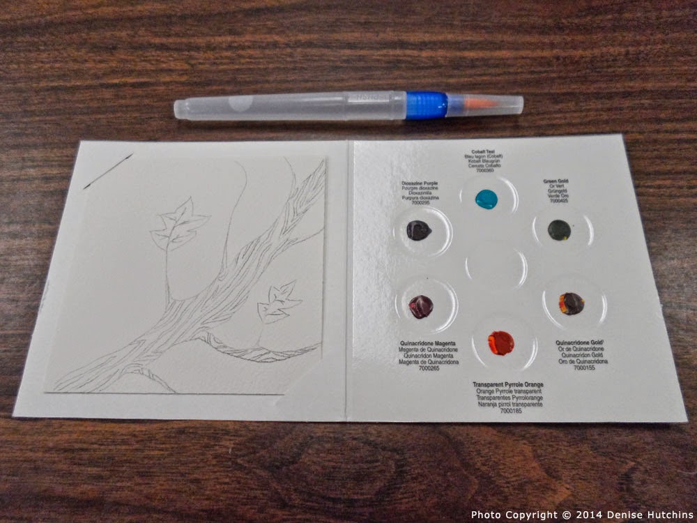 Watercolor Sample Palette with Sketch on Paper and Water Brush