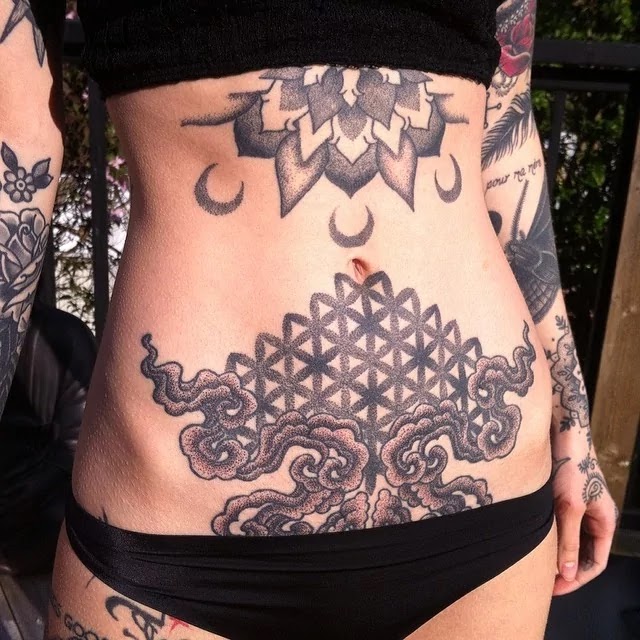 Pelvic tattoos can be part of tummy pieces. 