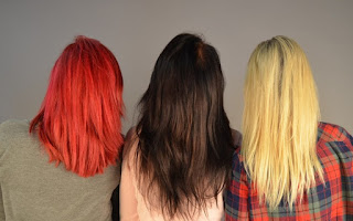 three women with different dyed hair colors.jpeg