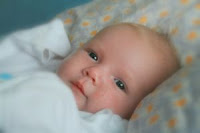 Baby face. Stock Photo credit: olga_salon