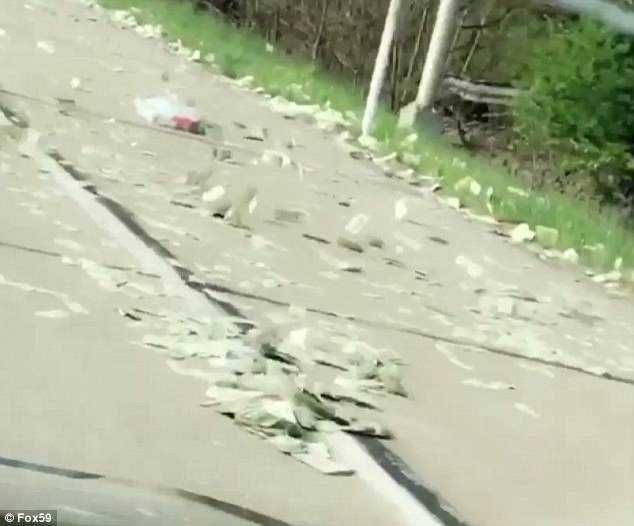 Truck Spills Over ₦216 Million On Indianapolis Highway Truck Spills Over ₦216 Million On Indianapolis Highway