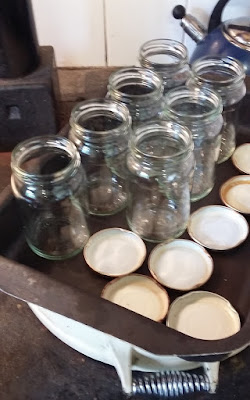 Photo of clean empty jars and lids on top fo the Aga, when I made home-made marmalade with MaMade