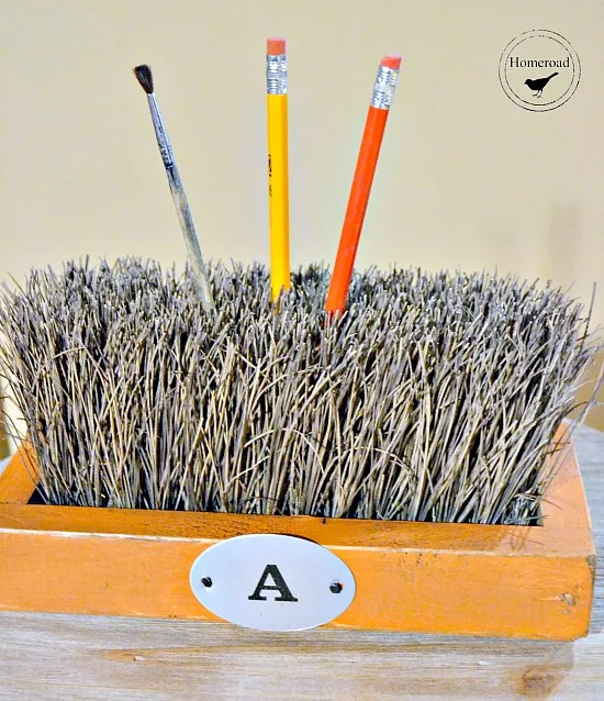 DIY push broom office pencil holder