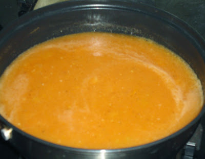 corn flour added to the boiling soup for tomato soup recipe