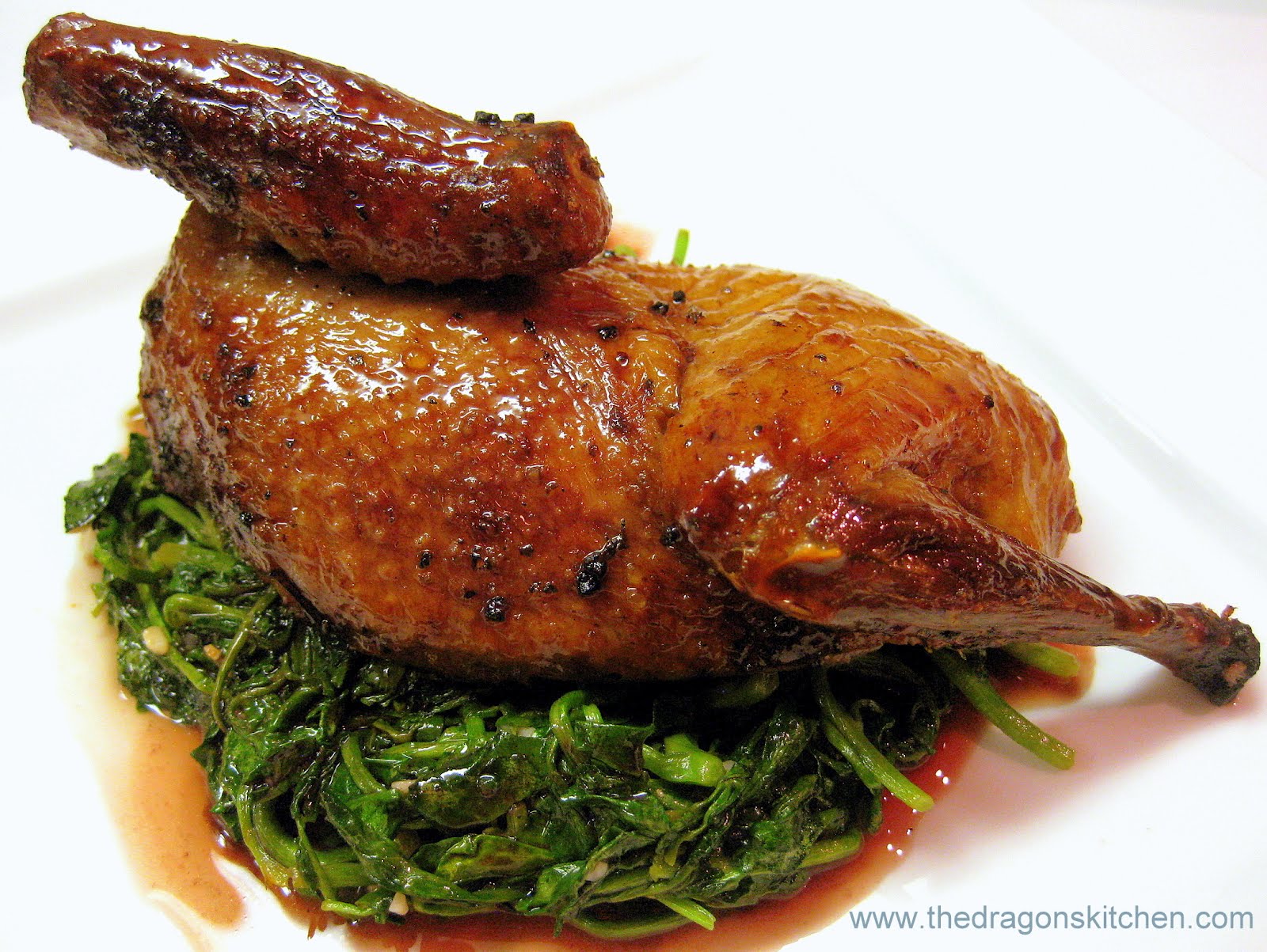 Dragon's Kitchen Roasted Squab on Wilted Cress Dragon's Kitchen Roasted Squab on Wilted Cress