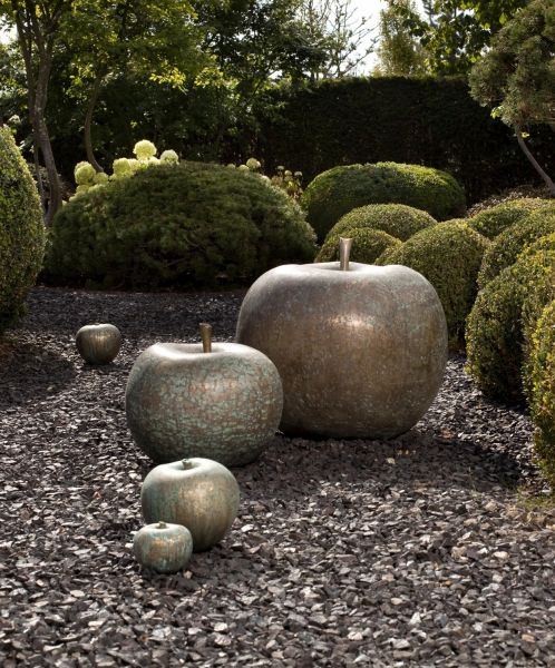 Fabulosas esculturas cerámicas de manzanas.