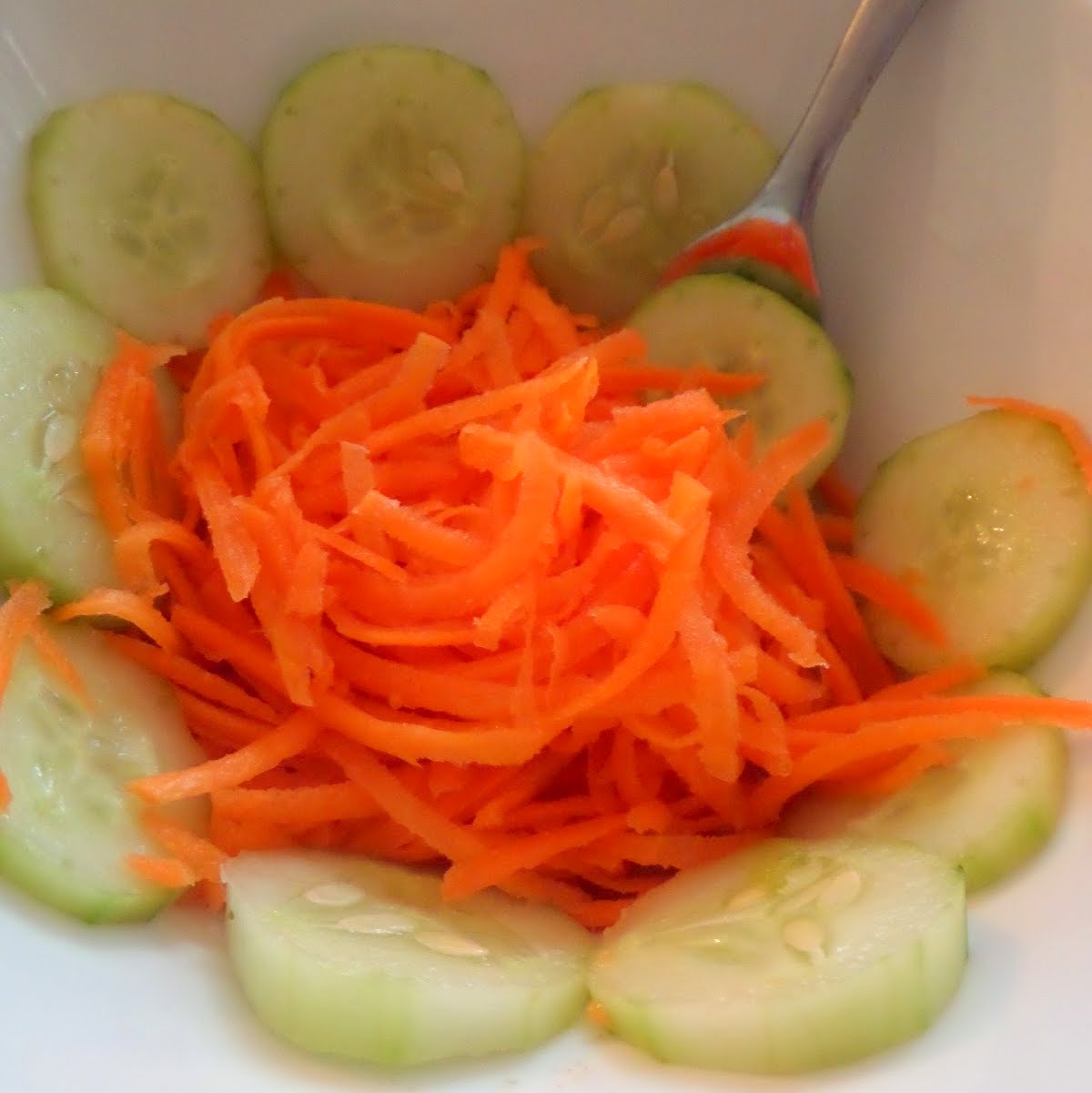Simple Carrot and Cucumber Salad:  A 3 ingredient salad of carrots, cucumbers and lemon juice.  So simple yet so tasty.