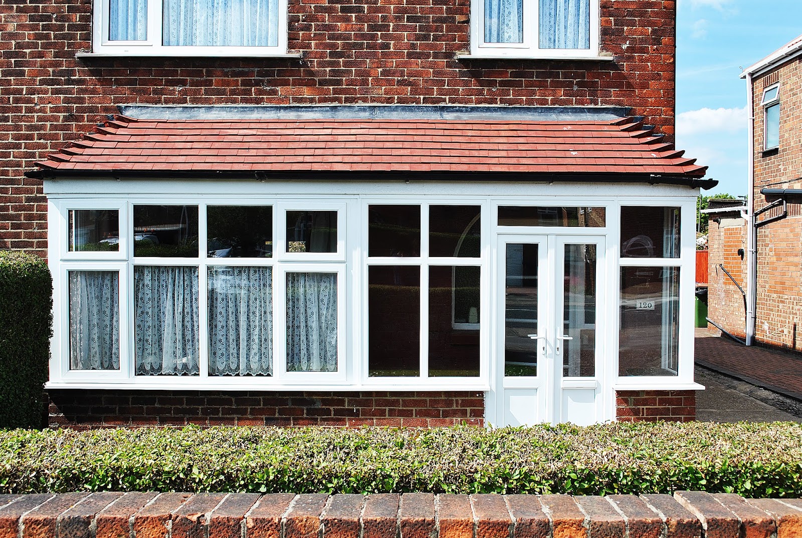 A Simple Rennovation UPVC Porch and Bay Combination with Rehau Frame work and French Doors