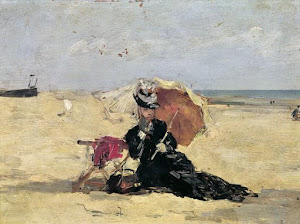 Woman with a parasol on the beach