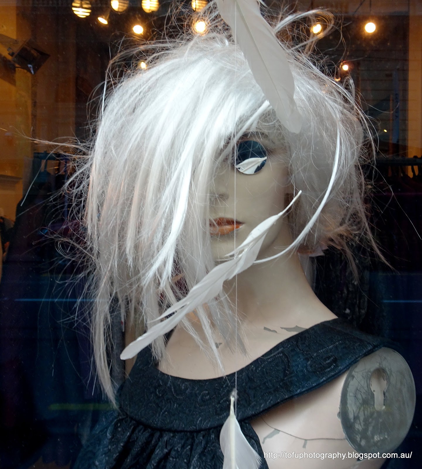 Tofu Photography A dreamy looking mannequin with wispy blonde hair in