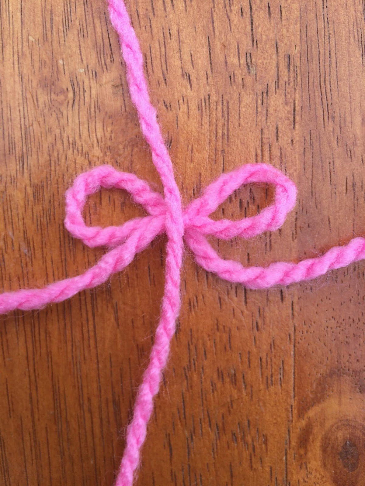 Jac o' lyn Murphy Simple, sweet yarn bow necklace