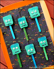 Brownie Brittle Monster Pops, fun Halloween treats made with caramel candies and brownie brittle | Recipe developed by www.BakingInATornado.com | #Halloween #recipe