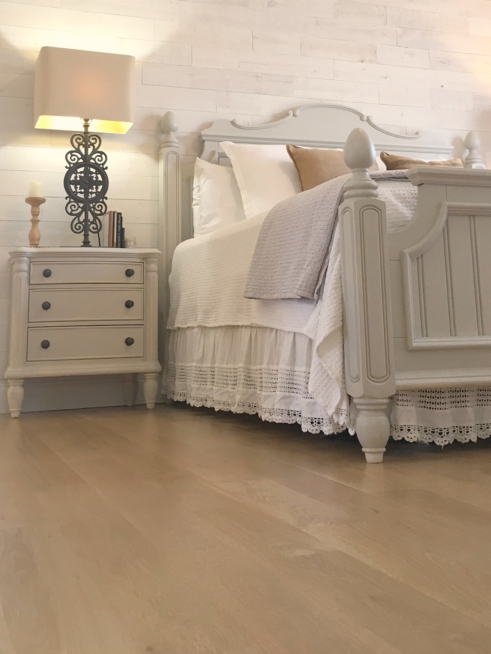 White oak hardwood flooring in a European inspired neutral home with spare interiors by Hello Lovely Studio. Learn more in this story about Wood Flooring Options: Engineered or Hardwood? #woodfloors #whiteoak #hellolovelystudio