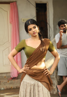 Ashna Zaveri in Sizzling Saree and Green Choli stills from Ivanuku Engeyo Macham Irukku movie