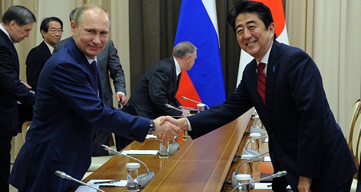 Shinzo Abe and Vladimir Putin Shinzo Abe and Vladimir Putin