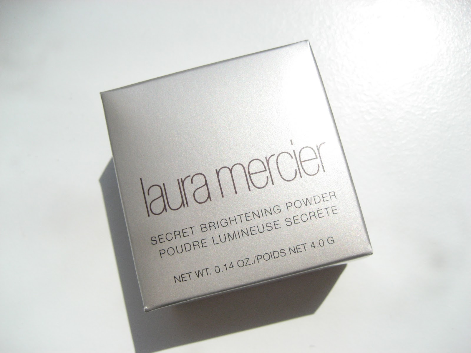 delicate hummingbird. Laura Mercier Secret Brightening Powder