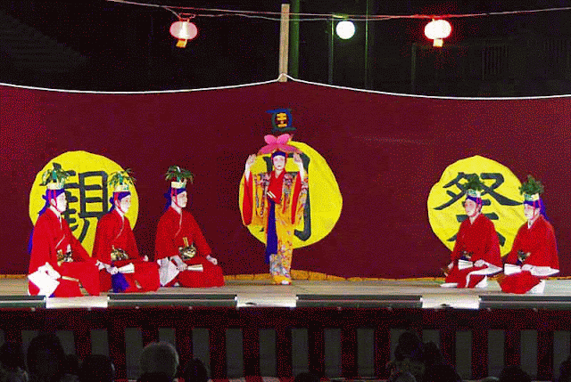 Women performing classic Okinawa dance, kimonos
