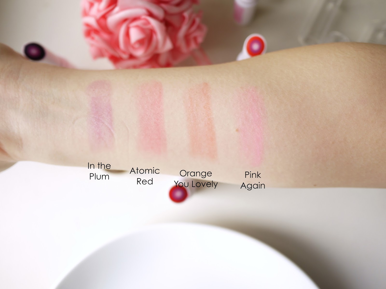 Mary Kay at Play Triple Layer Tinted Lip Balms in the plum pink again, atomic red orange you lovely reviews