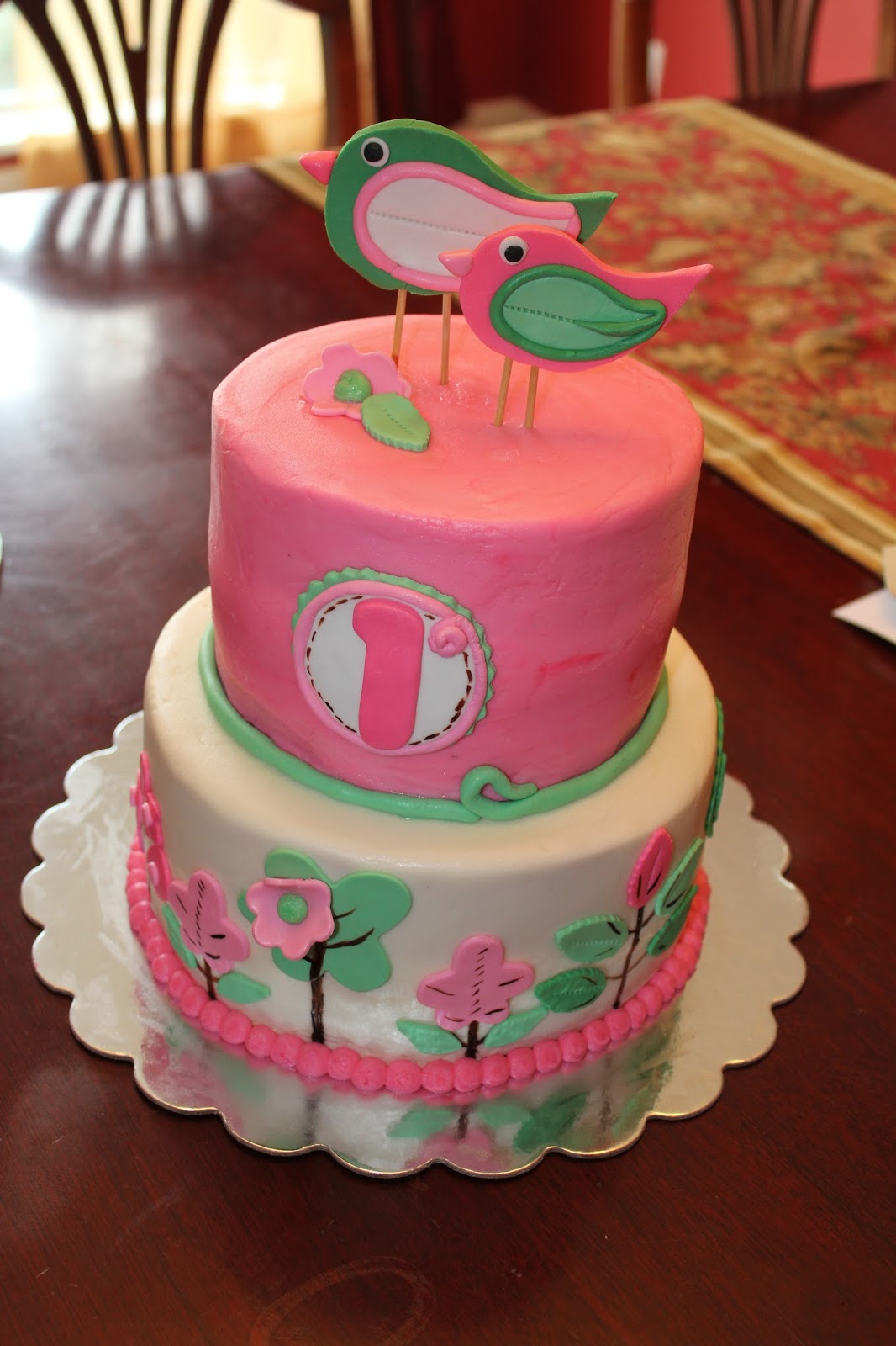 A Blissful Bash Baby birds first birthday cake