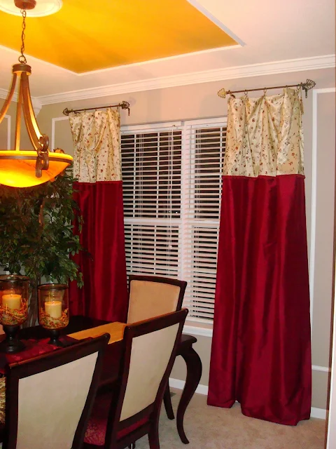 red and gold drapes dining room