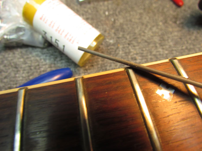 Guitar Fret Polishing and Fingerboard Cleaning Crawls Backward (When
