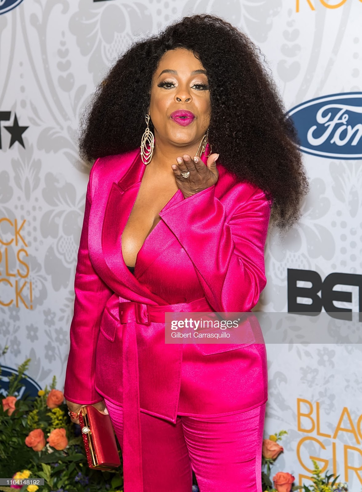 Ladies in Satin Blouses: Niecy Nash - pink satin suit