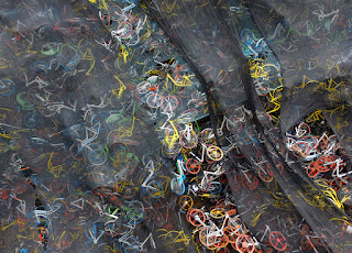 Millions of abandoned bicycles in China from ruined startups speculating on new bikes.