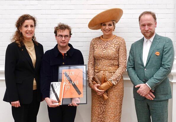 Queen Maxima wore Claes Iversen lace midi dress. Minister Ingrid van Engelshoven presented the award to Rory Pilgrim