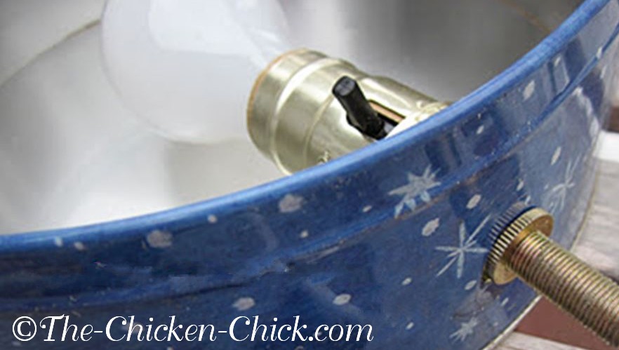 The Chicken Chick®: Make a Cookie Tin Waterer Heater. Under $10, &amp; 10 