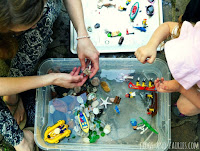 http://frogs-and-fairies.com/ocean-sensory-bin-adventure/