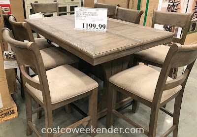 Get together for a meal with the family with the Pulaski Furniture 9-piece Counter Height Dining Set