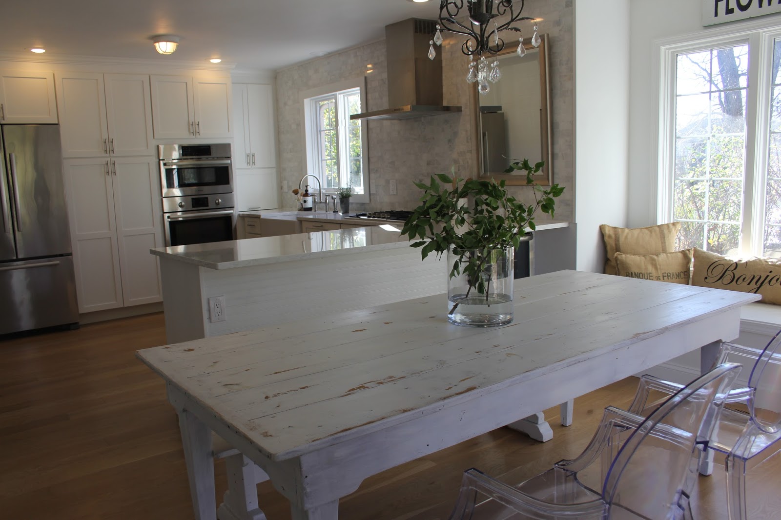 hello-lovely-studio-fixer-upper-white-kitchen-spare-farmhouse-table
