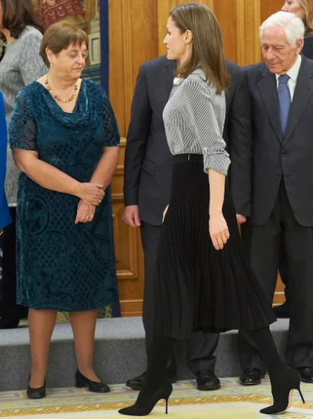 Queen Letizia wore Hugo Boss line Blouse, Magrit pumps and Boss black plated skirt, newmyroyals