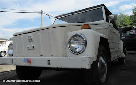 Front view of boxy 1973 VW Thing in white.