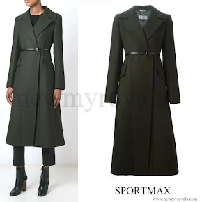 The Long Belted Coat is made of green virgin wool and comes from the Sportsmax Autumn/Winter 2015 Collection. It features a V neckline and two deep side pockets. It originally retailed for $1,800.