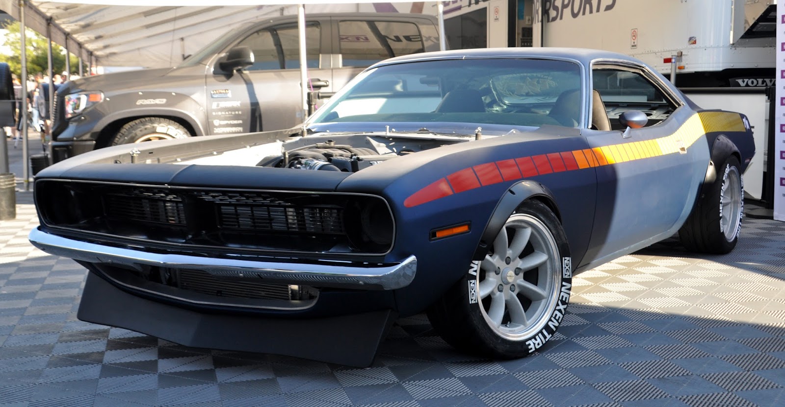 Just A Car Guy: there are rarely any Barracuda at SEMA, and fewer that