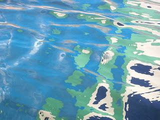 Nigel Kayaks abstract art in water reflections, Seattle