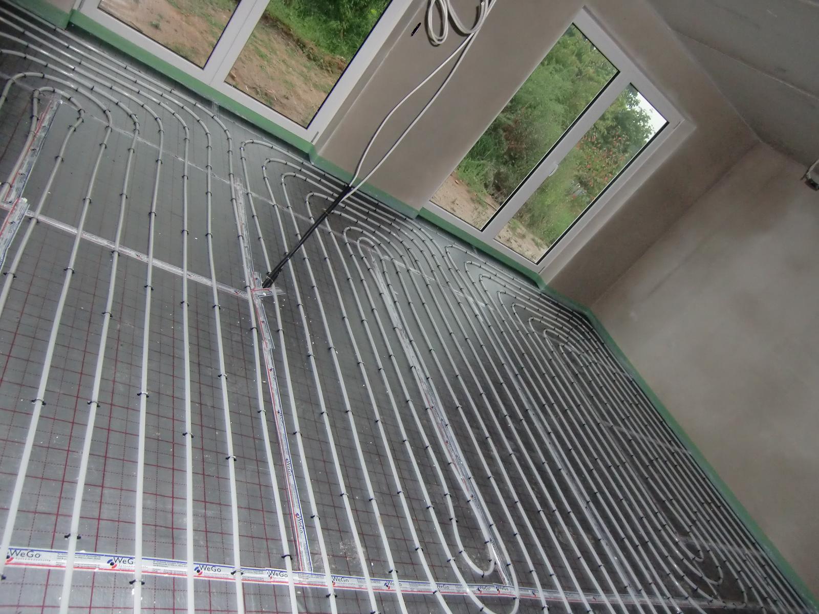 Neues vom Bau: Garage, Putz und Fussbodenheizung