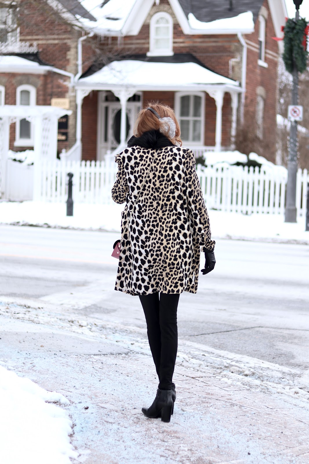 How to Wear Colour and Patterns in Winter- pink LOFT sweater, Leopard over coat, grey earmuffs, Topshop black boots 