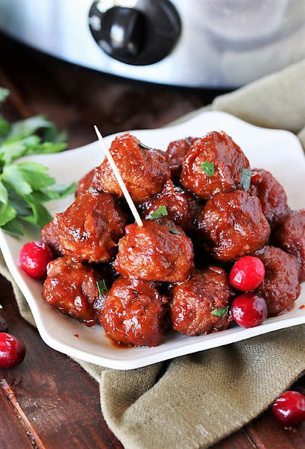 Slow Cooker Cranberry Meatballs image - Take advantage of slow cooker convenience for holiday get-together appetizers by serving up a batch of these classic Slow Cooker Cranberry Meatballs.  They're classic for a reason ~ because they're just plain good.
