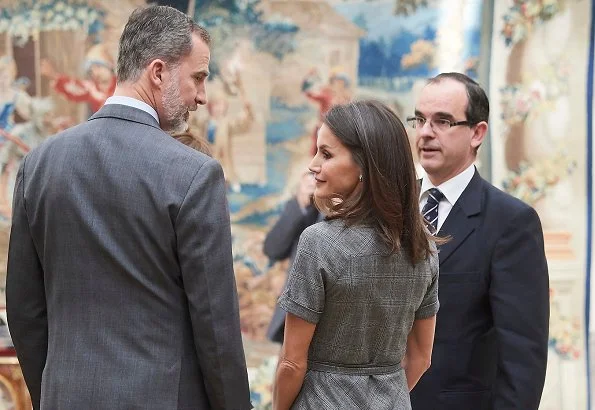Queen Letizia wore Massimo Dutti wool check belted dress
