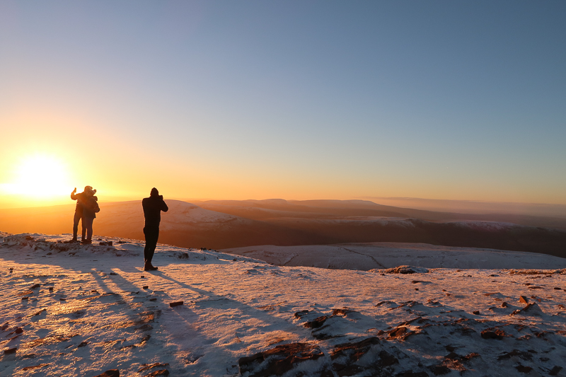 Climbing a Mountain in the Snow The New Year Vlog pen y fan mountain at sunset in the snow